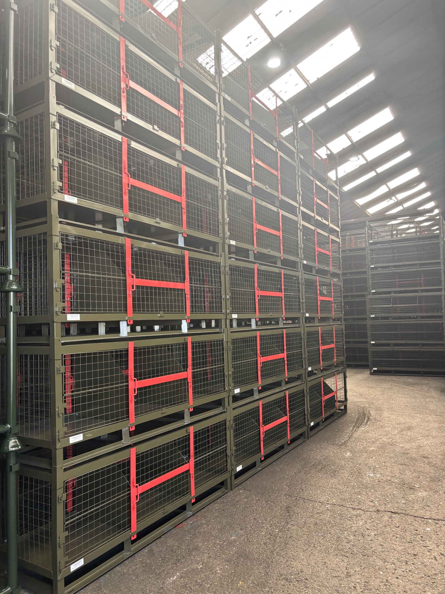 Stacked steel mesh stillages manufactured around a specific handling brief