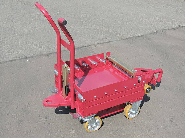 Compact wheeled industrial handling dolly